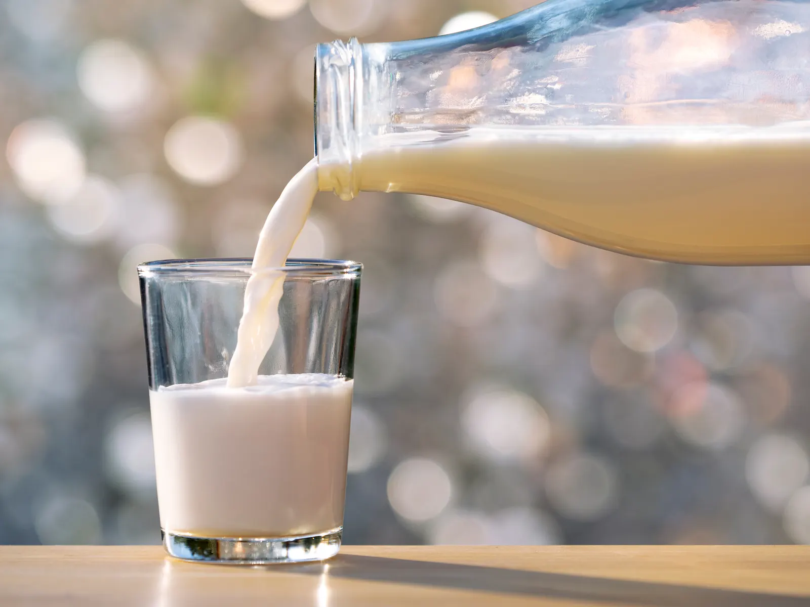 Milk being poured into a glass